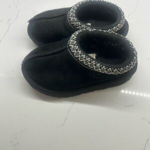 UGG Kids Black Slippers with Metallic Trim